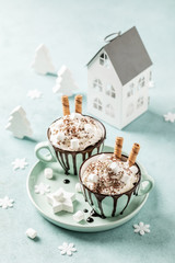 Hot chocolate festive dessert with whipped cream or ice cream
