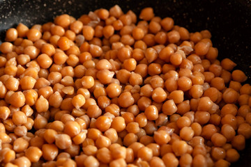 chickpeas with butter in a pan, vegeterian protein food