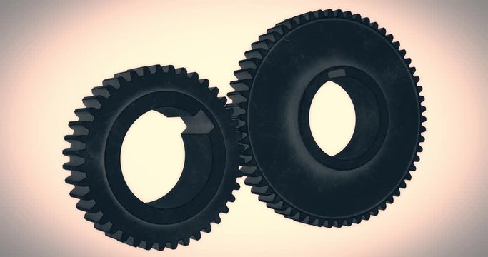 Two tooth metal gears wheel spinning background.Steel cogs and shafts of truck engine and gearbox. Motor components. Industrial machinery parts concept.Mechanical technology machine engineering symbol