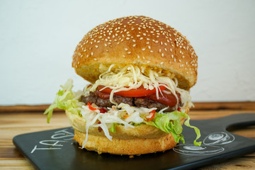Meaty hamburger in a restaurant