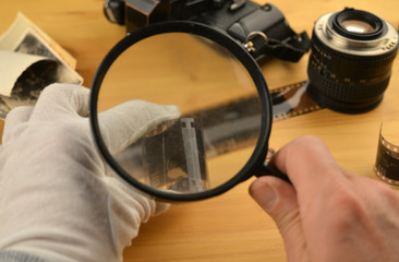 Analog photography concept old negative film strip cleaning