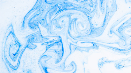 Fluid Art with white blue color. Abstract multicolored background. Blue white texture. Colored...