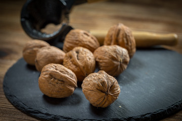 Whole nuts and nutcracker.