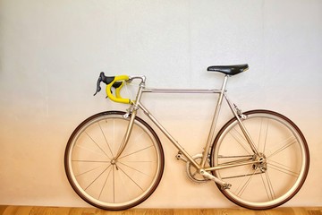 Fototapeta na wymiar vintage bicycle on light background