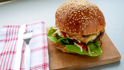 Meaty hamburger in a restaurant