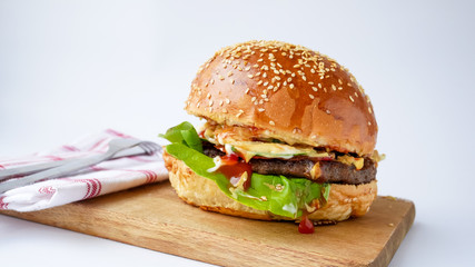 Meaty hamburger in a restaurant