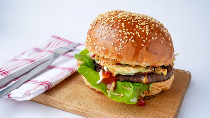 Meaty hamburger in a restaurant
