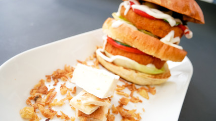 Meaty hamburger in a restaurant