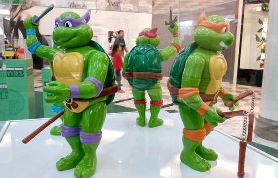 KUALA LUMPUR, MALAYSIA -AUGUST 23, 2018: Selected focused of fictional action figure character TEENAGE MUTANT NINJA TURTLE. Displayed by collector on desk for public. 