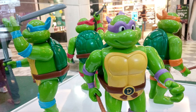 KUALA LUMPUR, MALAYSIA -AUGUST 23, 2018: Selected focused of fictional action figure character TEENAGE MUTANT NINJA TURTLE. Displayed by collector on desk for public. 