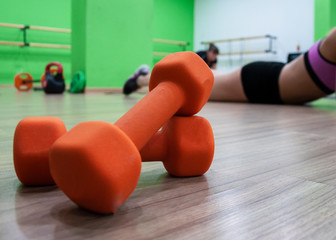 Fototapeta na wymiar woman doing fitness exercises in gym