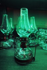 Vintage gas lamps in mysterious green lighting