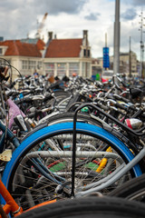 Pile of bikes parked near the Central Station in Amsterdam