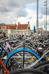 Obraz na płótnie Canvas Pile of bikes parked near the Central Station in Amsterdam