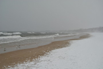 Gdansk Brzezno beach at winter time, Poland.  Big waves on the Baltic sea. 