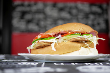 Meaty hamburger in a restaurant