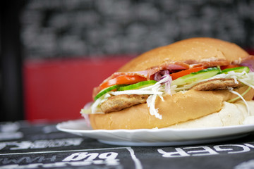 Meaty hamburger in a restaurant