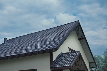 Corrugated metal roof and metal roofing. Modern roof made of met