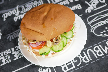 Meaty hamburger in a restaurant