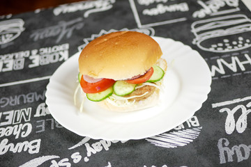 Meaty hamburger in a restaurant