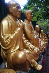 Golden monk statues at the Ten Thousand Buddhas Monastery, Hong Kong