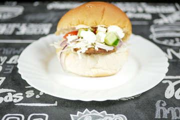 Meaty hamburger in a restaurant