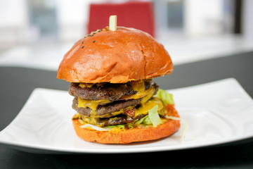 Meaty hamburger in a restaurant