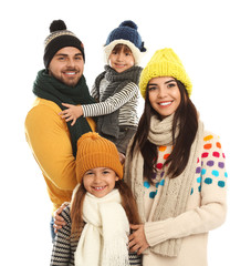 Happy family in warm clothes on white background. Winter vacation