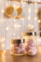 Interior Christmas decorations, jars with pink marshmallows