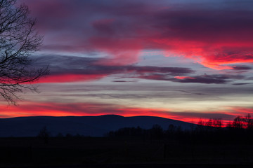 Red sunset over mountains