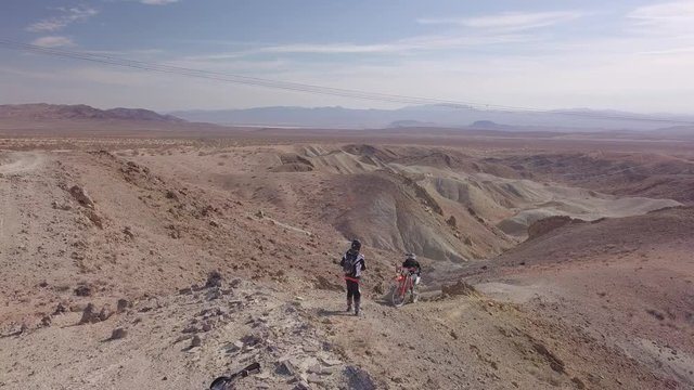 Two Dirt Bikers in The Desert