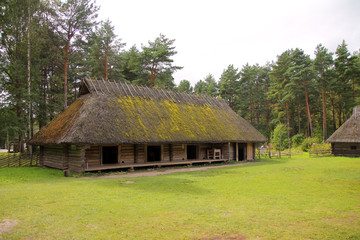 Fototapeta na wymiar Historic rural wood Baltic farm in Estonia