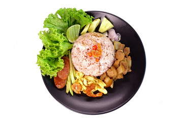 Fried rice with shrimp paste (Khao khluk Kapi) isolated on white background, a flavorful dish in Thai cuisine that consists of primary ingredients of fried rice mixed with shrimp paste (Kapi).Top view
