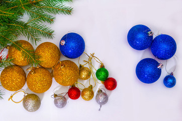 colorful christmas decorations scattered on a white background, preparation for decorating the...