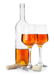 Bottle and glasses of tasty wine on white background