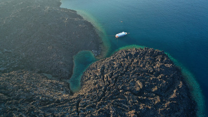 Naklejka na ściany i meble Aerial drone photo of main crater of Santorini island volcano called Kameni, Cyclades, Greece