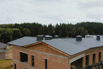 Corrugated metal roof and metal roofing. Modern roof made of met