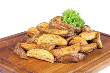 fried  french fries. home made in rural style and served on on wooden board. healthy organic vegetarian food or beer snack. close up view