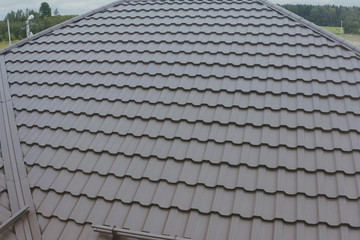 Corrugated metal roof and metal roofing. Modern roof made of met