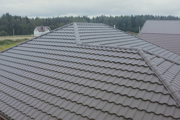 Corrugated metal roof and metal roofing. Modern roof made of met