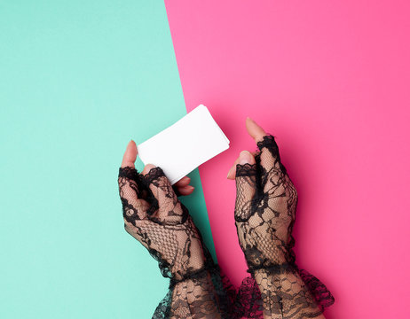 Two Female Hands Holding A Stack Of Empty White Paper Business Cards