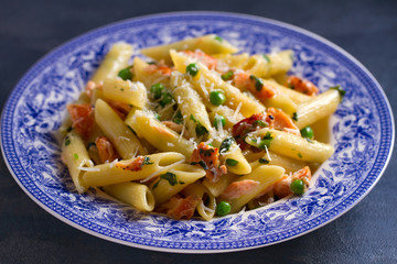 Creamy salmon penne pasta with green peas