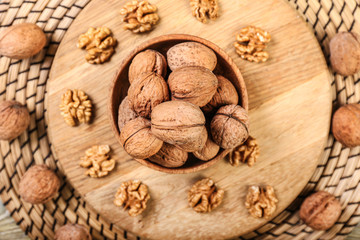 Composition with tasty walnuts on table