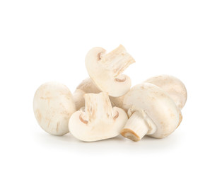 Fresh champignon mushrooms on white background