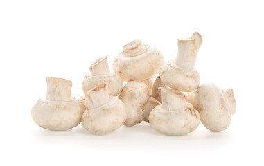 Fresh champignon mushrooms on white background