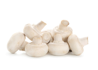 Fresh champignon mushrooms on white background