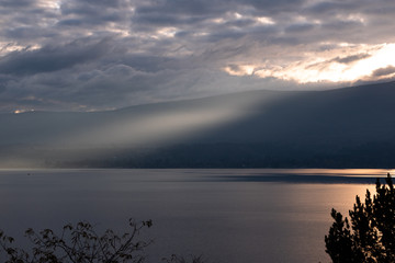 Sunbeam streaking across the lake.