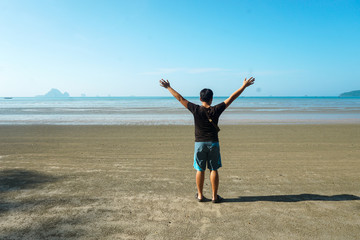 Obraz premium Freedom by the sea.Relaxing at the beach holiday