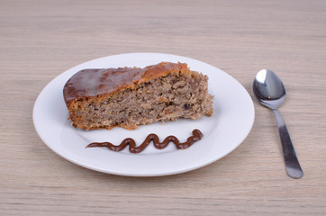 Carrot cake in caramelised milk sauce