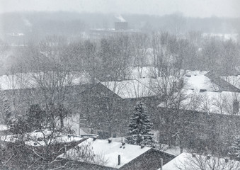 Winter snowstorm blizzard snow storm scenery. Snowfall on Montreal city background. Quebec, Canada.